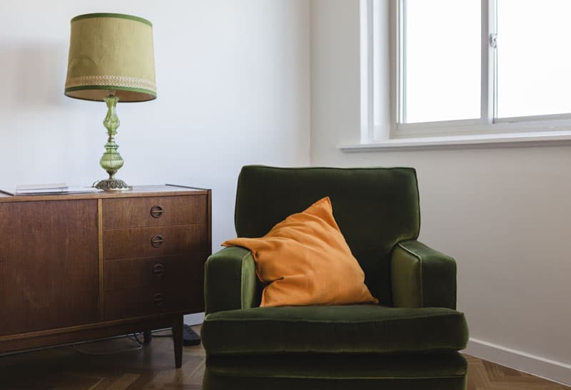 velvet chair in minimalist room