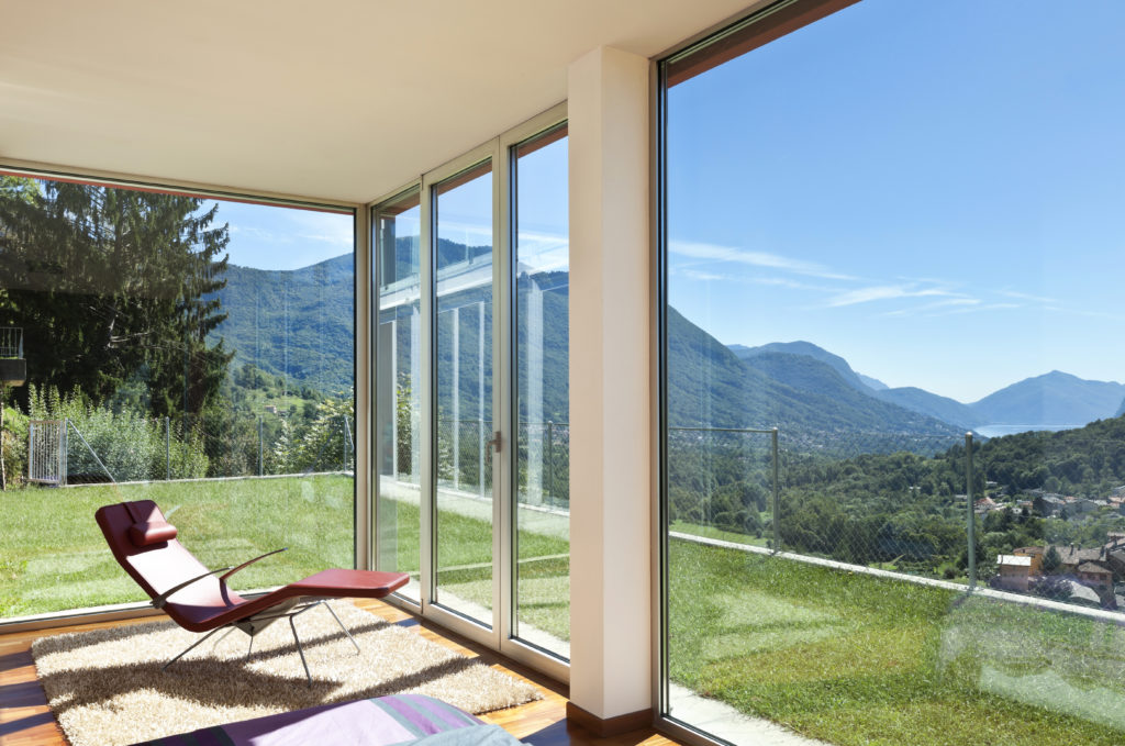 Energy efficient glass window with view of mountain