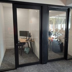 After - New black  commercial aluminium doors with side-lights