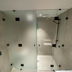 10mm Frameless panels in frosted and clear glass with black fittings